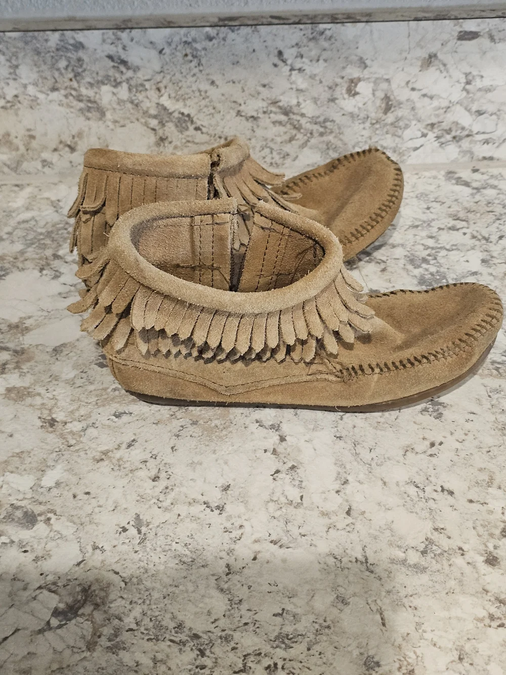Minnetonka Kids Fringe Moccasin Boots in Tan Suede